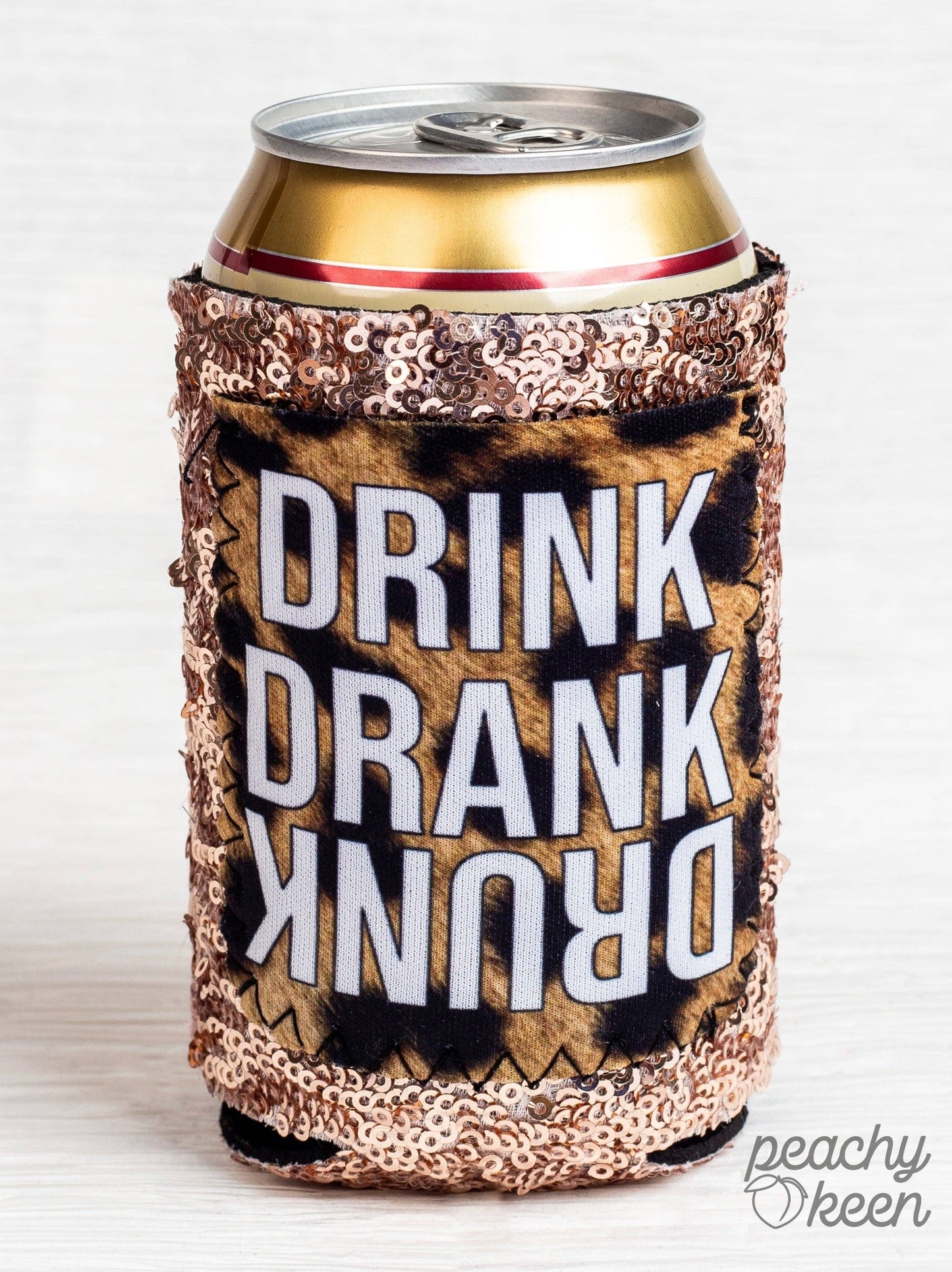 Peachy Keen Can Coolers are designed for the active and stylish user in mind. This can cooler will help keep your drinks cold for hours, and fits all regular-sized shaped cans perfectly. 100% genuine neoprene sleeve that keeps the temperature cold, and an additional added square for the design, so moisture does not affect the designed area. Perfect gift for party favors, birthday gifts, vacation, wedding favors, and more!
Fit:12oz can