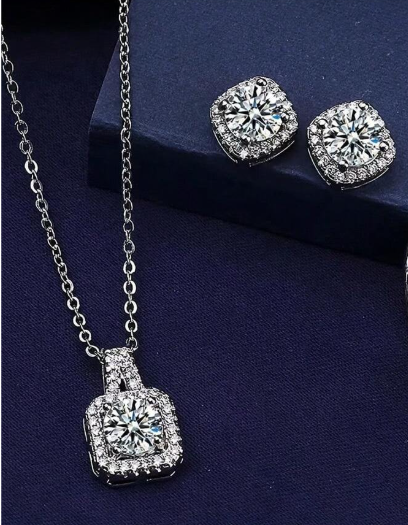 Zinc Alloy
Cinderella- get ready for the ball! This dainty 16" chain features a square mount encrusted with bright little cz's with a matching pair of earrings will complete your princess look!