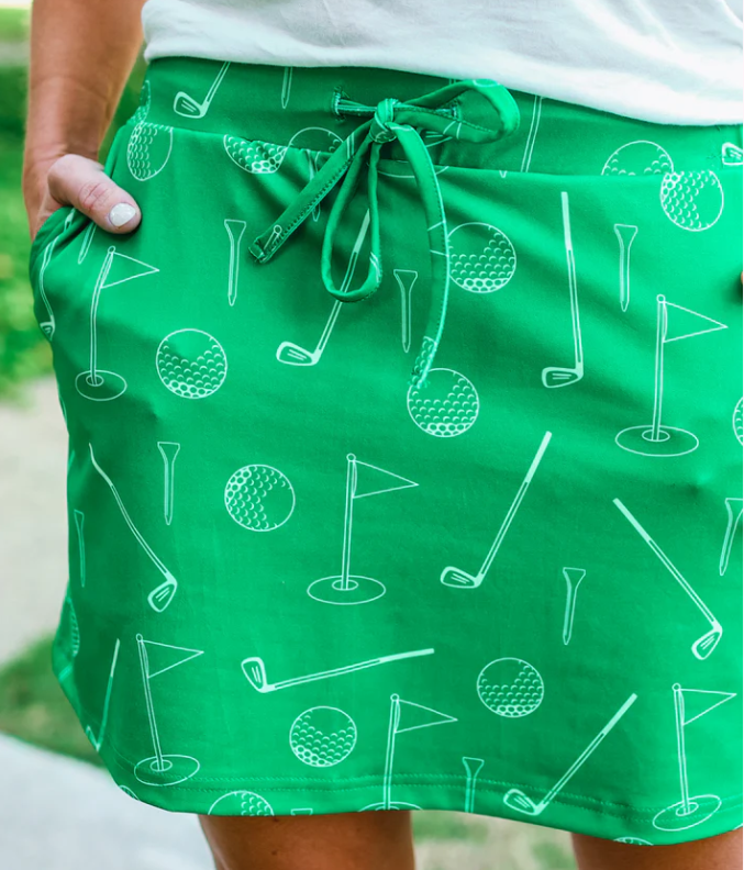 85% polyester / 15% Spandex
Join the fun in this golf-inspired skort that's perfect for starting style conversations. Its lightweight fabric, elastic waistband, and built-in shorts ensure comfort while keeping you totally trendy. Don't forget the side pockets and drawstring for a practical yet playful touch!