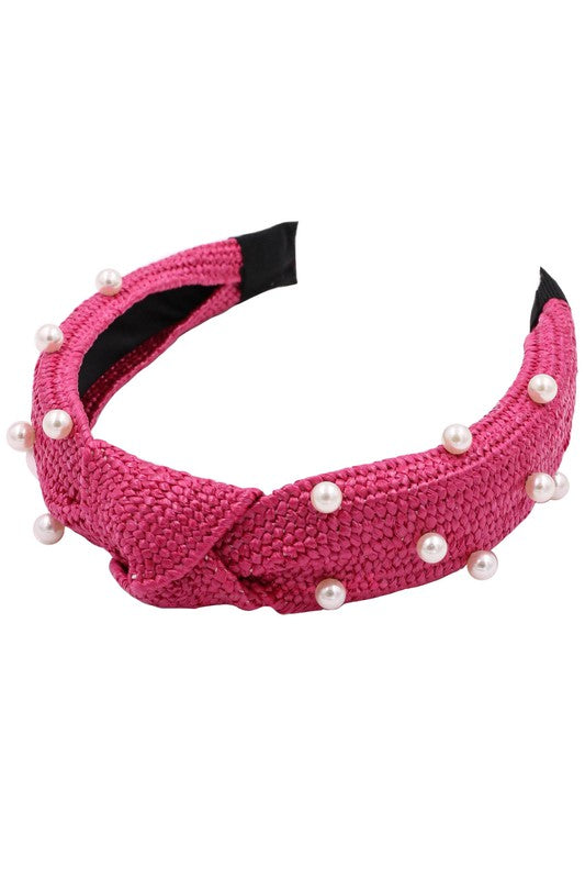 Add a pop of color and style to any outfit with these Colorful Raffia Knot Head Band! Vibrant hues embellished with pearls so you can express yourself- just make sure not to get too wild!