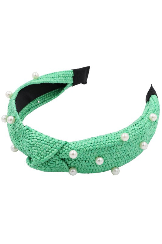 Add a pop of color and style to any outfit with these Colorful Raffia Knot Head Band! Vibrant hues embellished with pearls so you can express yourself- just make sure not to get too wild!