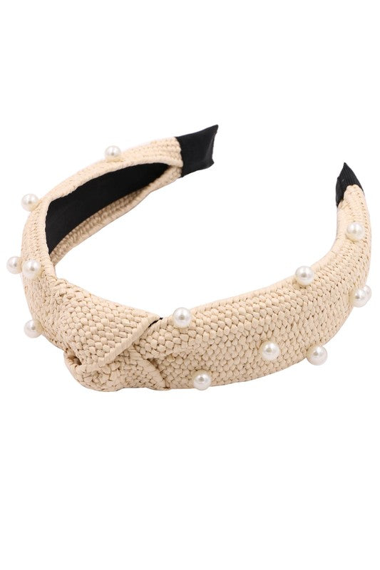 Add a pop of color and style to any outfit with these Colorful Raffia Knot Head Band! Vibrant hues embellished with pearls so you can express yourself- just make sure not to get too wild!