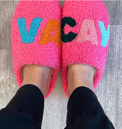 100% polyester
Stay cozy in style with our VACAY Slippers. These slippers feature a fun and colorful lettering in a comfortable design. Perfect for lounging at your favorite travel destination or on the plane.
Sizing: S (5-6) M (6.5-7.5) L (8-9)