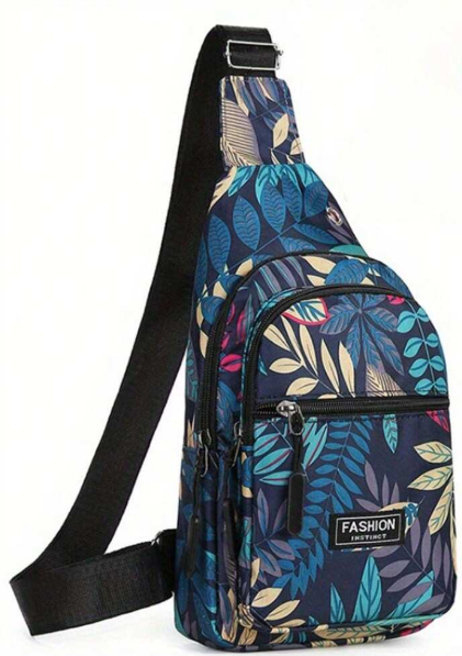 This is a fabulous handbag with leaf decor has a sleek adjustable strap that works well as a shoulder bag or worn sidecar. This bag has zippers aplenty to secure all of your valuables. 