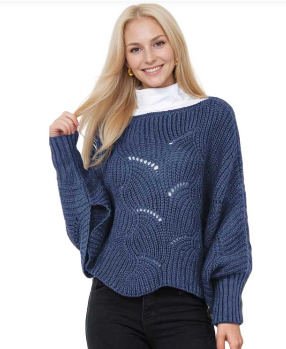 Woman wearing a blue sweater on a white background