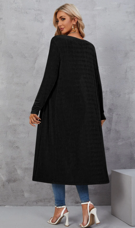 93% polyester / 7% elastane Wardrobe staple! This cardigan is effortlessly chic and should be your top pick for any occasion, day or night! This piece pairs well with the wide leg pants with the cut out hem! Machine Wash.