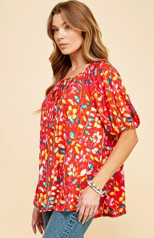 Spice up your wardrobe with this fab floral top! Its front tie adds a playful touch to any outfit. Plus, it pairs perfectly with jeans, leggings, shorts, skirts, and even a blazer for a sleek and chic look.