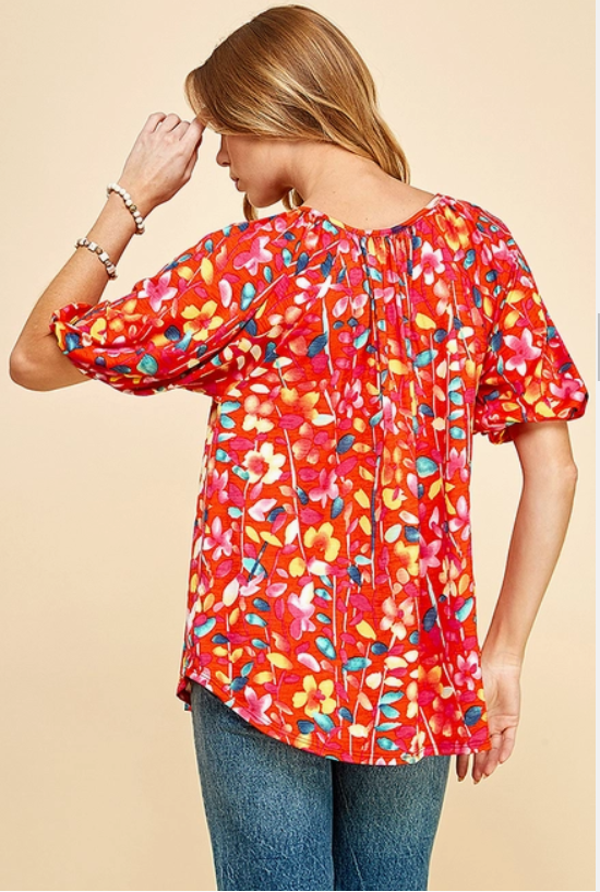 Spice up your wardrobe with this fab floral top! Its front tie adds a playful touch to any outfit. Plus, it pairs perfectly with jeans, leggings, shorts, skirts, and even a blazer for a sleek and chic look.
