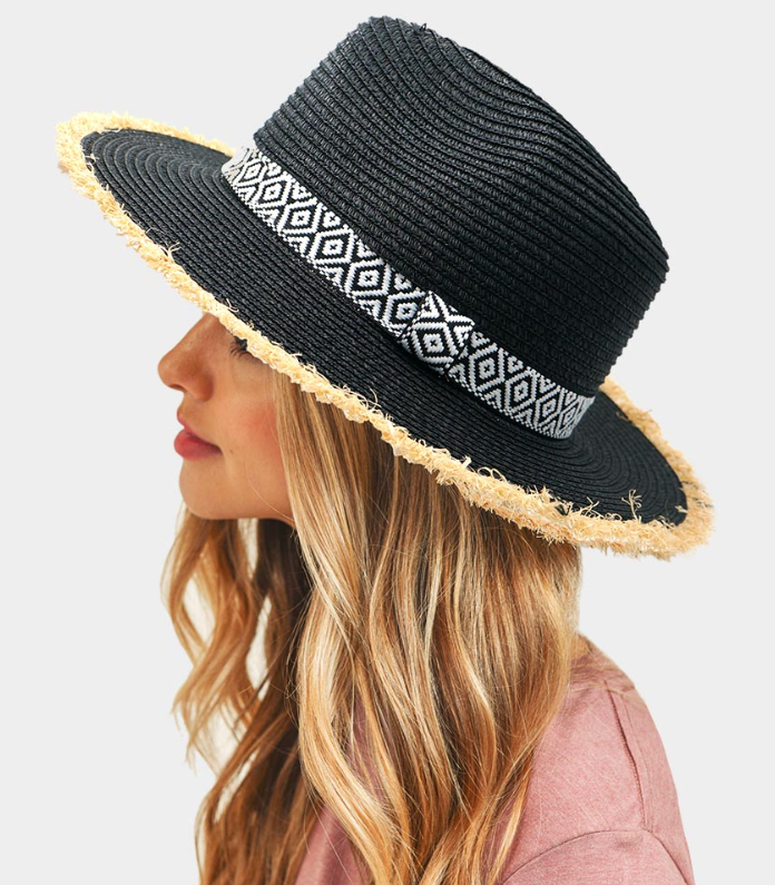 100 % Polyester Introducing our Frayed Trim Aztec Straw Hat - Black! Don't let frayed trim scare you, this playful hat will add polish to any outfit. Its straw material brings a bit of the outdoors to your ensemble, while the Aztec design adds a fun pop of pattern. Trust us, this hat will have you feeling cool and confident!