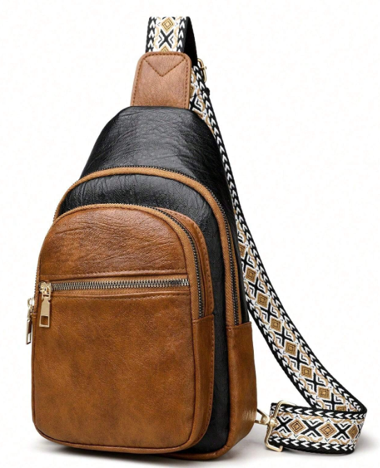 Don't miss out on this essential addition to your wardrobe - the versatile Backpack Crossbody in a classic black and tan combo boasts a stylish design that'll never go out of fashion!