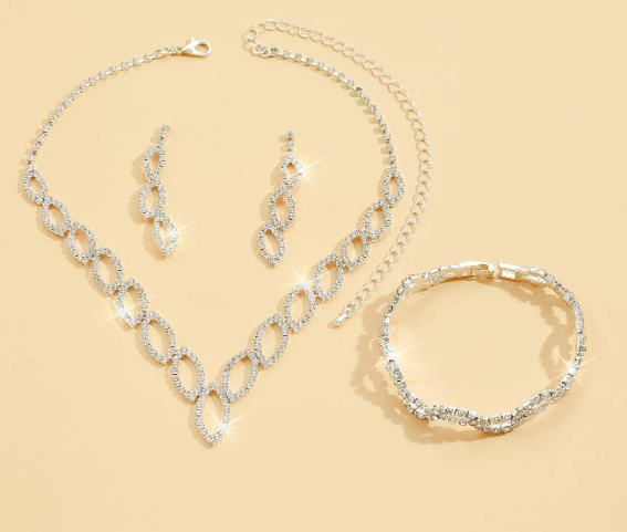 Make your holiday party or dress up event sparkle with this blingy jewelry set! Perfect for standing out and having some fun. This set includes a necklace, earrings & a bracelet at a great price!