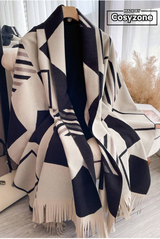 100% polyester
Add some spunk to your outfit with our Geo Pattern Jacquard Shawl! Drape it over your shoulder for a laid-back vibe or keep it in place with one of our magnetic brooches.
Do not machine wash.