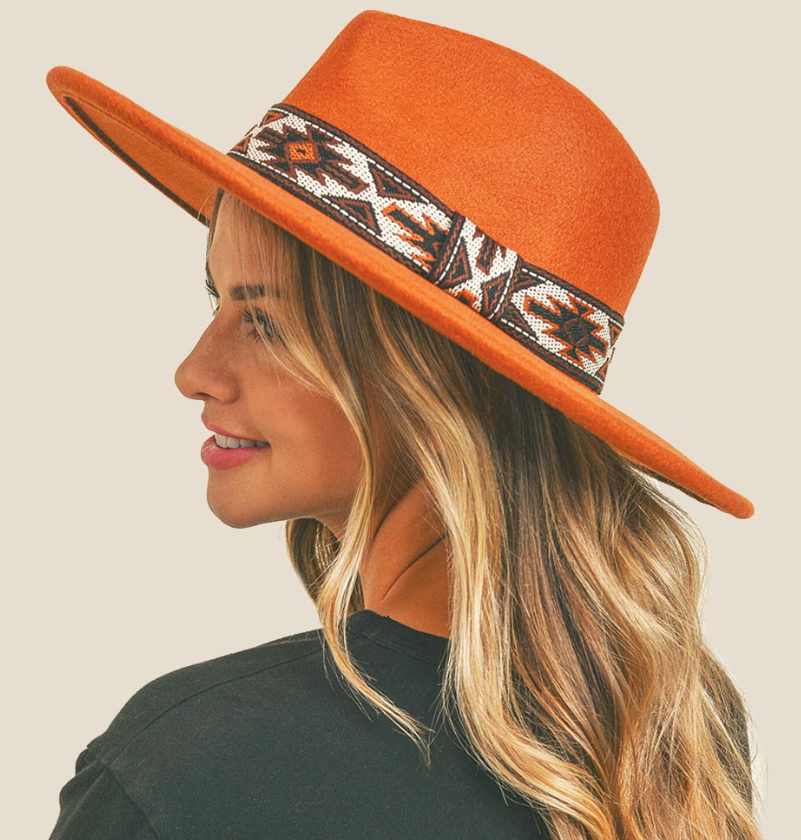 100 % Polyester Achieve effortless style with the Tribal Band Panama Hat. Shield yourself from the sun in comfort and elevate your look with this timeless piece. Perfect for any occasion, it's a must-have in your accessory collection!