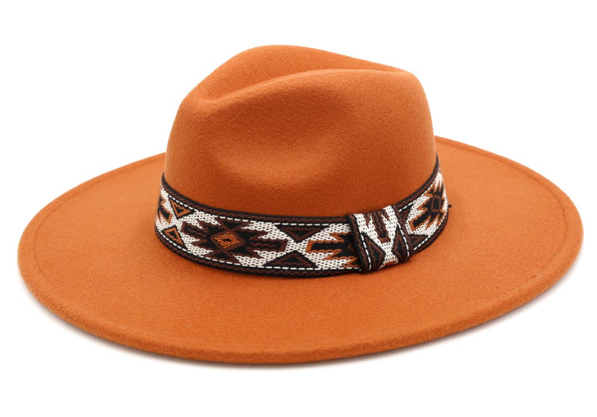 100 % Polyester Achieve effortless style with the Tribal Band Panama Hat. Shield yourself from the sun in comfort and elevate your look with this timeless piece. Perfect for any occasion, it's a must-have in your accessory collection!