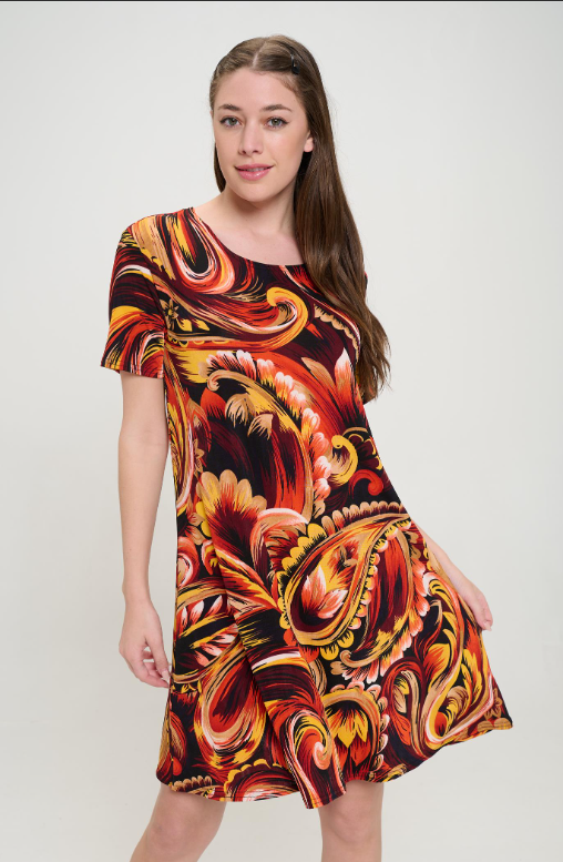 90% polyester / 10% spandex Get all-day comfort and style in this rust-colored paisley dress with a round neck, short sleeves, and flowy fabric that hits at the knees. Don't forget to complete your look with a jacket from this collection for any weather—perfect for any mood (or occasion)! Hand or machine wash in cold water. Made in U.S.A