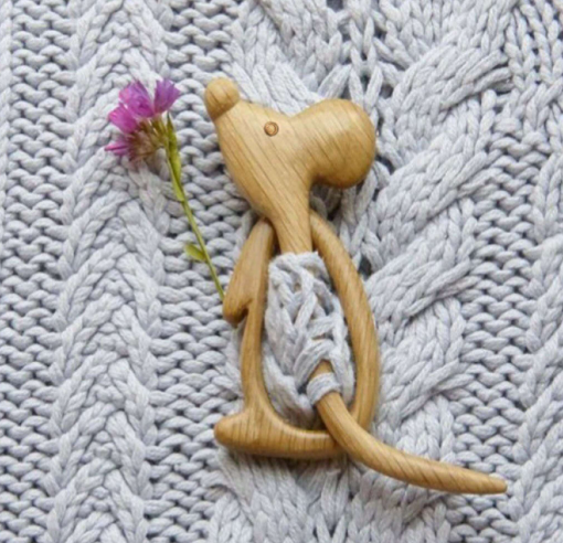 This is one of those pieces that you didn't know you were missing until you saw it! This sweet little mouse works on any knit piece from sweaters to scarves & hats!