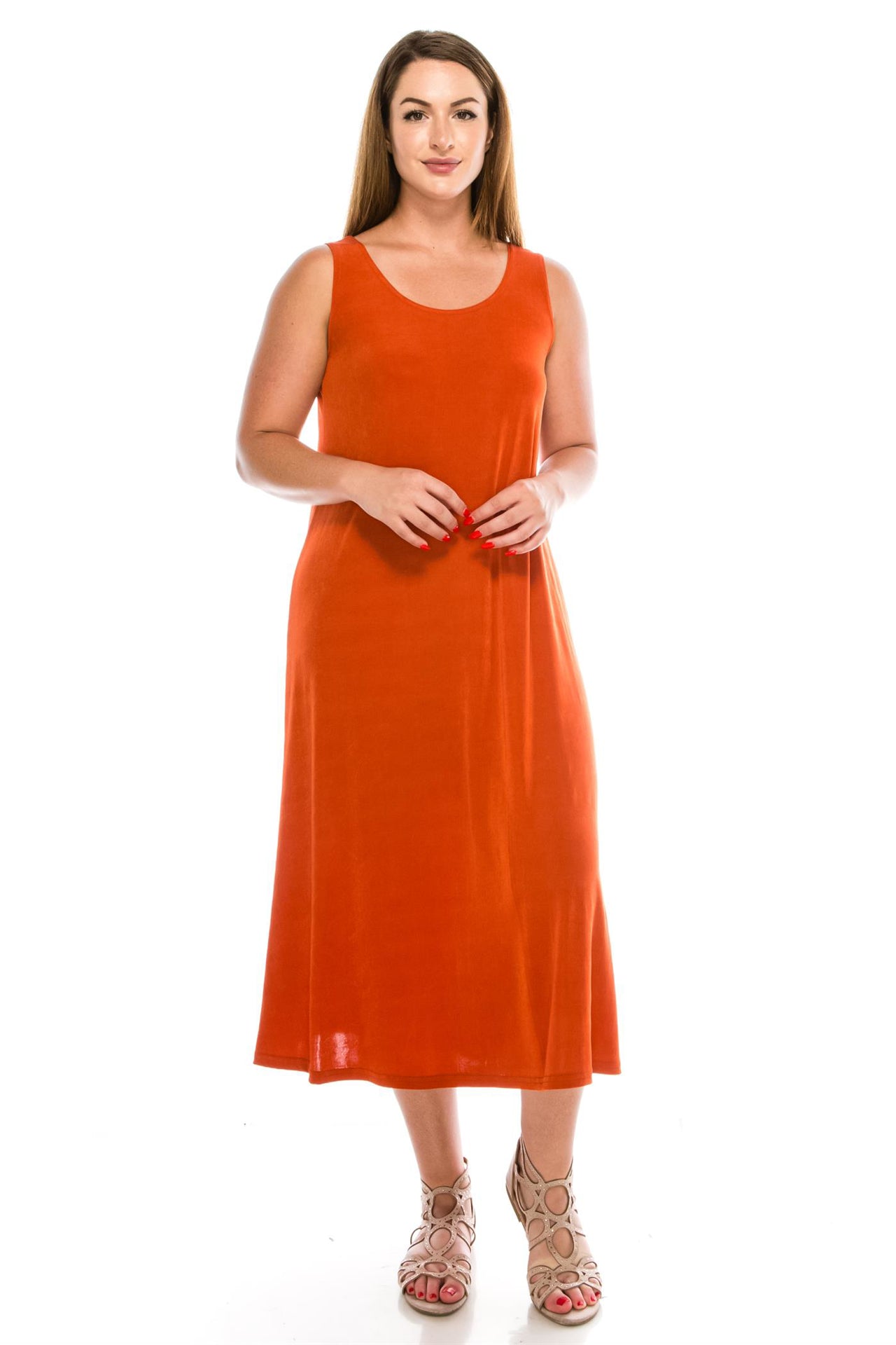 90% polyester / 10% spandex  Treat yourself to effortless elegance with this flowy, feminine dress. Boasting a round neckline and wrinkle-free fabric, this dress is perfect for any and every occasion. Step out in style and turn heads wherever you go!  Hand or machine wash in cold water.  Made in U.S.A