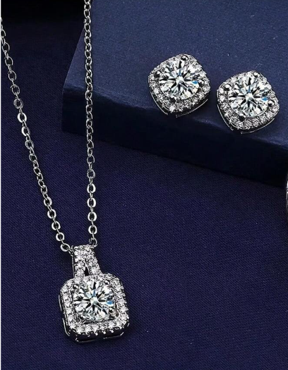 Zinc Alloy

Cinderella- get ready for the ball! This dainty 16" chain features a square mount encrusted with bright little cz's with a matching pair of earrings will complete your princess look!