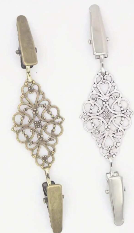 These decorative double sided clasps will help secure your sweater in a fashionable way!