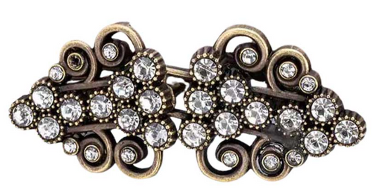 Spruce up your outfit with these fabulously functional clips! Use them to keep your tops, capes, sweaters, cardigans, and more perfectly closed. They're real showstoppers!