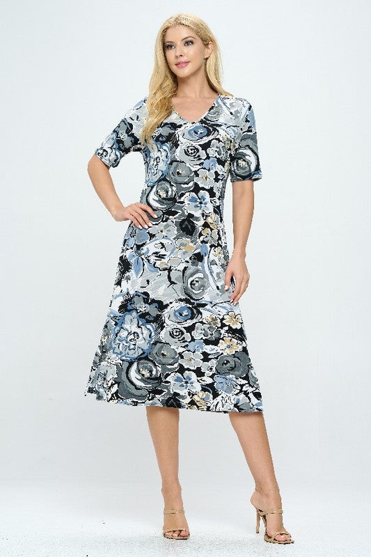 90% polyester / 10% spandex  Flourish in fabulousness with this flowy floral dress-  sure to be a stunner wherever you head looking like a garden of gorgeousness!  Hand or machine wash in cold water.  Made in U.S.A