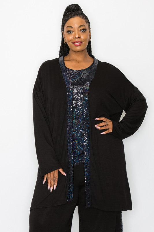 Sequins: 87% nylon / 8% metallic / 5% spandex Cardigan 95% rayon / 5% spandex  Take your holiday ensemble to the next level with this chic cardigan! The luxurious, easy flow and sparkling sequin accents flowing down one side and across the other will give you an extra boost of sass. And with 6" slits on the sides, you'll have a touch of flair that's flirty and fun.