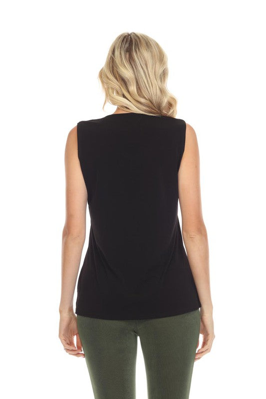 94% Poly / 6% Spandex  Elevate your wardrobe with this exquisite Pointed Hem No Wrinkle V-Neck Tank, designed for those who enjoy a sleek, timeless silhouette. Crafted with a wrinkle-free fabric and delicate pointed hem, this V-neck tank is sure to refine your elevated style.  Hand or machine wash in cold water.  Made in U.S.A