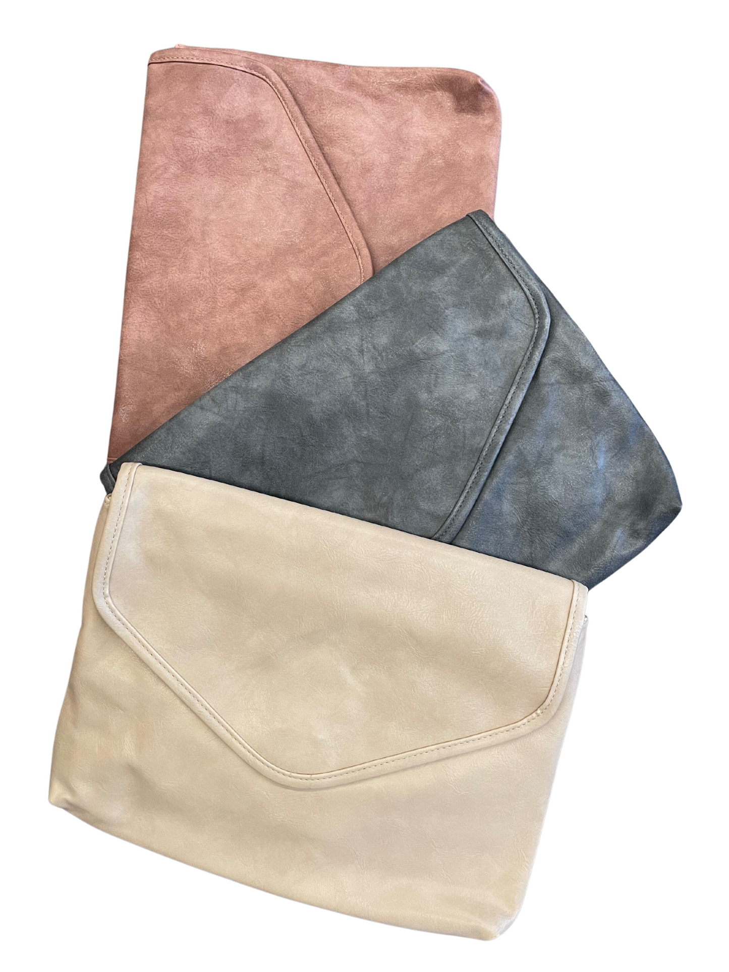 Vegan Leather  Discover an exceptional crossbody bag with hidden features! Boasting a zigzag design interior, 2 pockets, and zippered compartment inside and sporting a snap closure, zipper pocket outside with a customizable strap that can be removed or adjusted to your liking.  Size: 13.5"x10.25"
