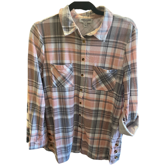 Slip into seasonal chic with this super soft and flowy Buffalo Plaid top. A serious feature making this a unique top are the lower hem side vents with 3 buttons! You'd be a 'plaid' fool to miss out!

Size Guide: S 6/8; M 10-12; L 14-16; XL - 16-18; *1XL - 16-18; 2XL 20-22; 3XL 24-26
29" Front &amp; Back
* 1XL runs wider than XL

Machine Washable&nbsp;