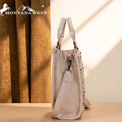 Gray handbag with Montana West logo on a wooden surface