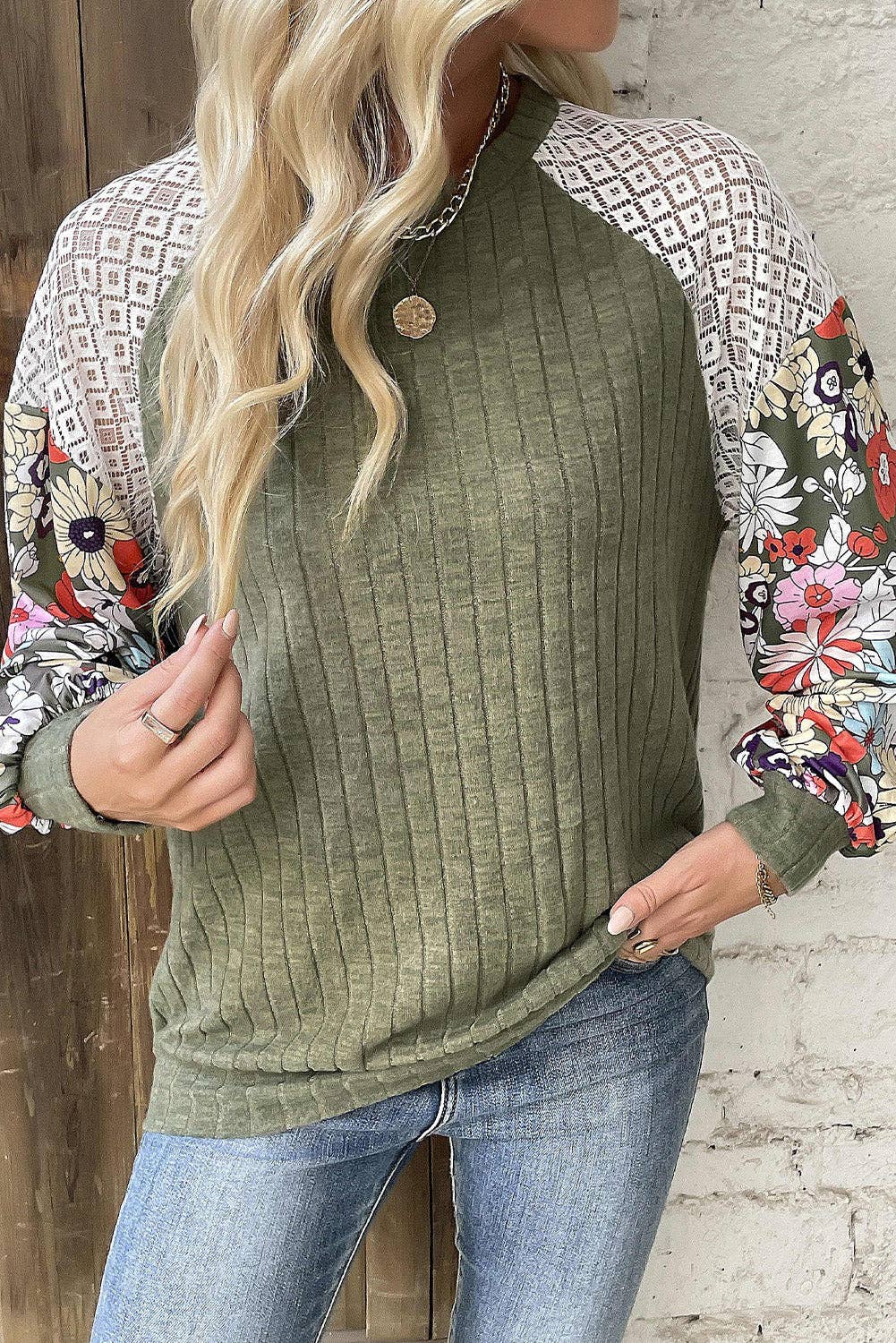 97% polyester / 3% elastane  This blouse has an elegant lace patch design in a ribbed knit fabric that is&nbsp; soft and textured. This top is perfect for any occasion - daily, holiday, work, and more!