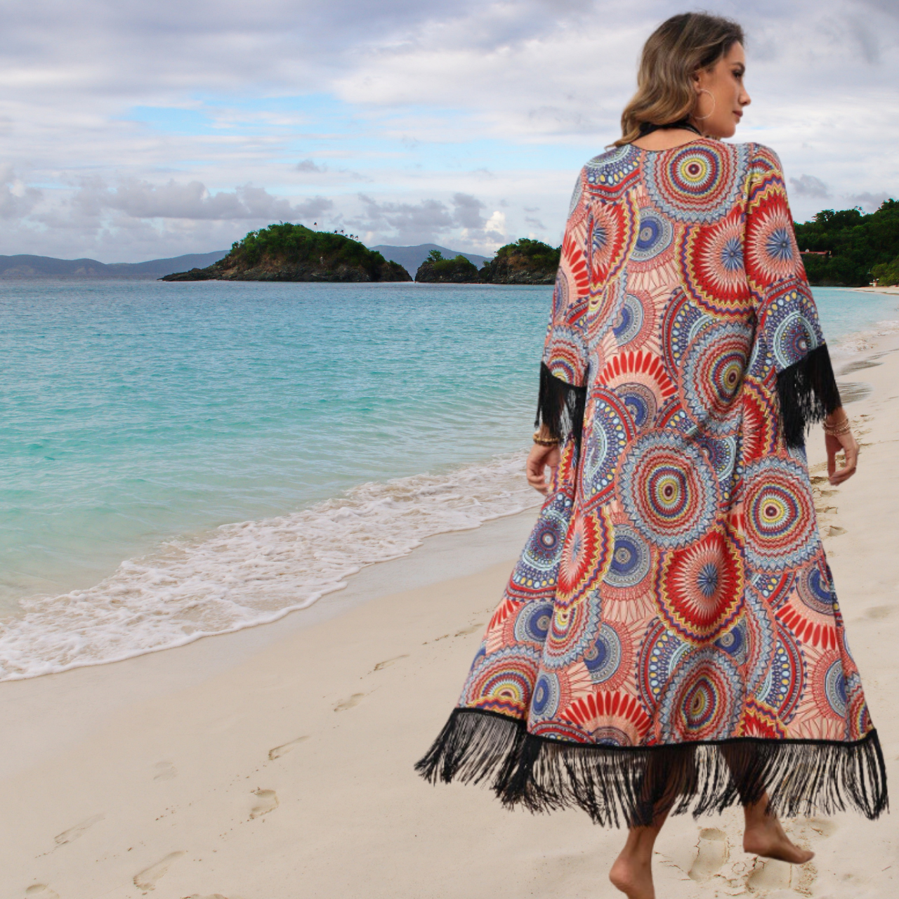 95% polyester / 5% elastane  Capture attention in this bright and lively mandala kimono boasting 6" fringe on the sleeves and hem. Perfect for a breezy cover-up or a lightweight layer to combat the evening chill - this is a must-have!  Machine Wash