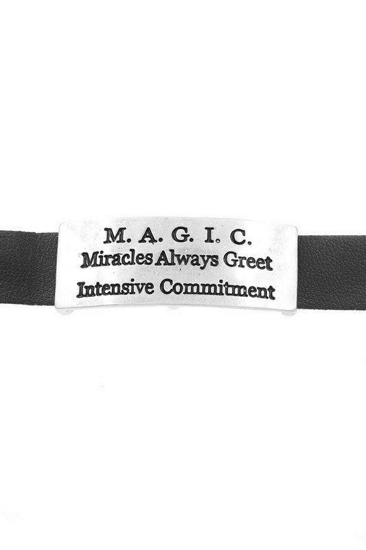 <p><span data-mce-fragment="1">faux leather &amp; metal </span></p> <p><span data-mce-fragment="1">This leather band has an engraved metal plaque with 'M.A.G.I.C. Miracles Always Greet Intensive Commitment'. Great self reminder or how about those graduates on your list?!</span></p> <p><span data-mce-fragment="1">Length: 7 3/4" Plaque length: 1 1/2" Magnetic closure</span></p>