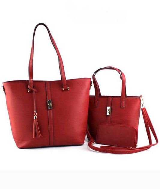Two red handbags on a white background