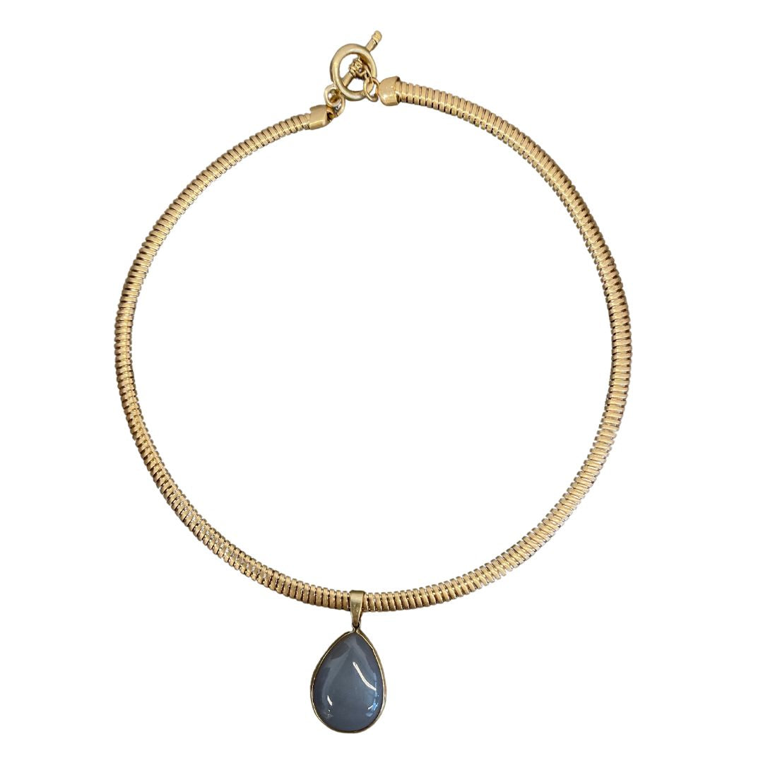 This omega style necklace features a pretty teardrop faux milky blue aquamarine stone has a toggle clasp fastener for a quick and secure closure.