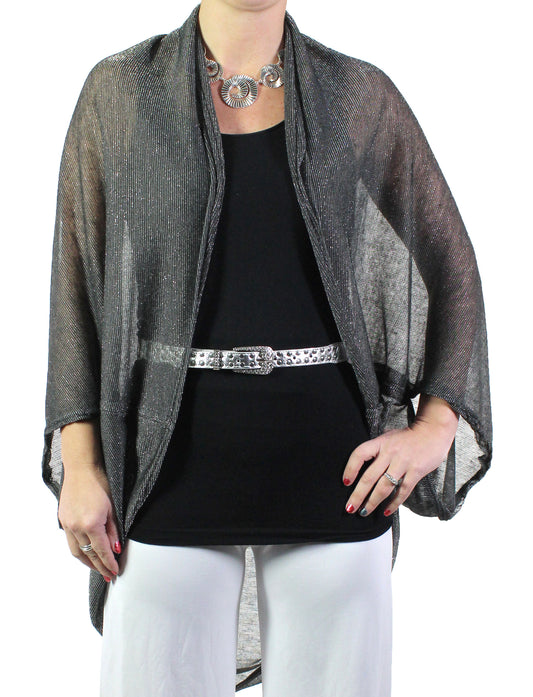 65% Polyester / 35% Cotton

This timeless piece sparkles with just a hint of lurex, adding a touch of glam without going over the top. Crafted from a soft, lightweight mesh fabric, it’s accented with shimmering lurex for a playful yet elegant look.