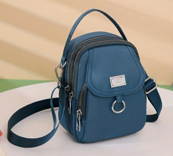 Multi Zip Pocket Crossbody