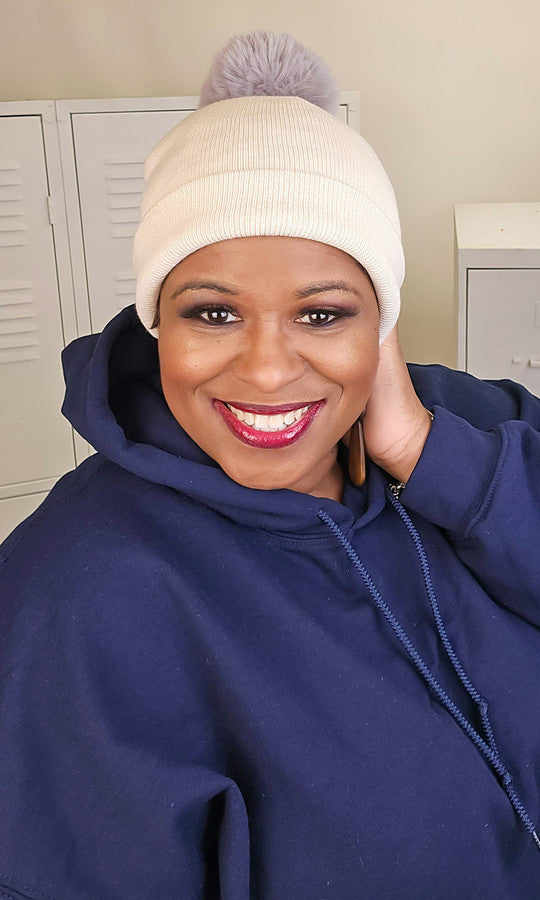 100% polyester

Keep your noggin warm in any elements with this perfect day-to-day beanie! The simple design includes a banded bottom and a fluffy fur pom on top.

Care Instructions: Hand wash. Lay flat to dry.