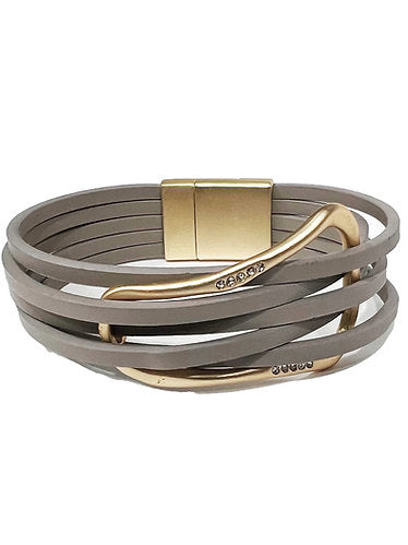 Who doesn't love being able to not ask for help with the clasp of your jewelry This is a multistrand leather bracelet featuring a buckle look and magnetic clasp.