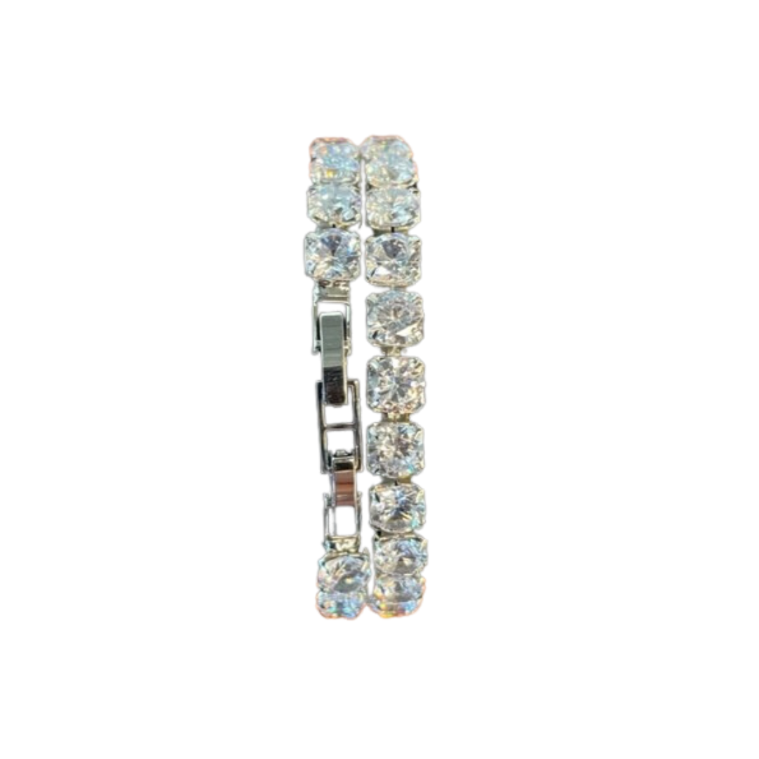 Tennis bracelets don't just have to be for the court! Up your bling game with this upscale clasp bracelet for day or night – more bang for your buck (literally)! Layer 'em up for an instant 'pow'!