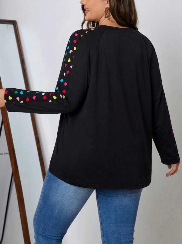 95% polyester / 5% elastane  You're going to LOVE this top! This relaxed fit top is great for lounging or casual wear- and pair well with our black or fuschia lounge pants!  Machine Washable
