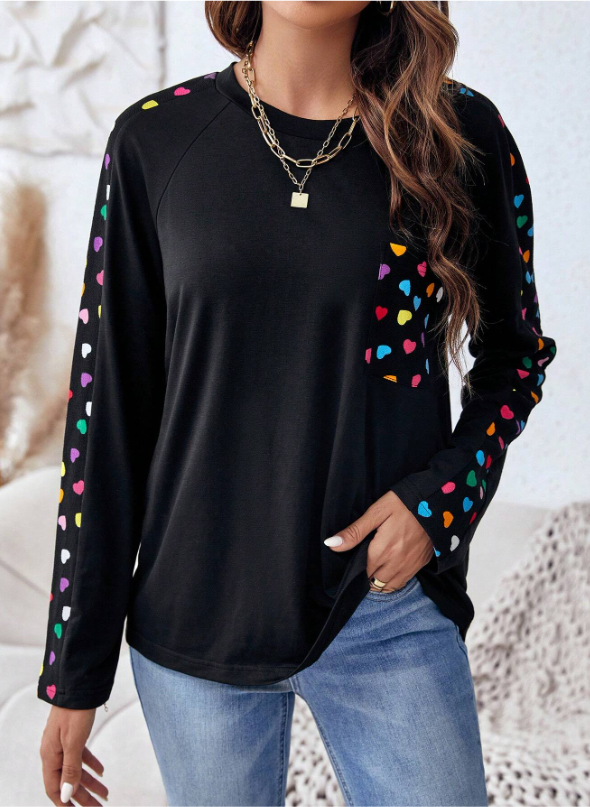 95% polyester / 5% elastane  You're going to LOVE this top! This relaxed fit top is great for lounging or casual wear- and pair well with our black or fuschia lounge pants!  Machine Washable
