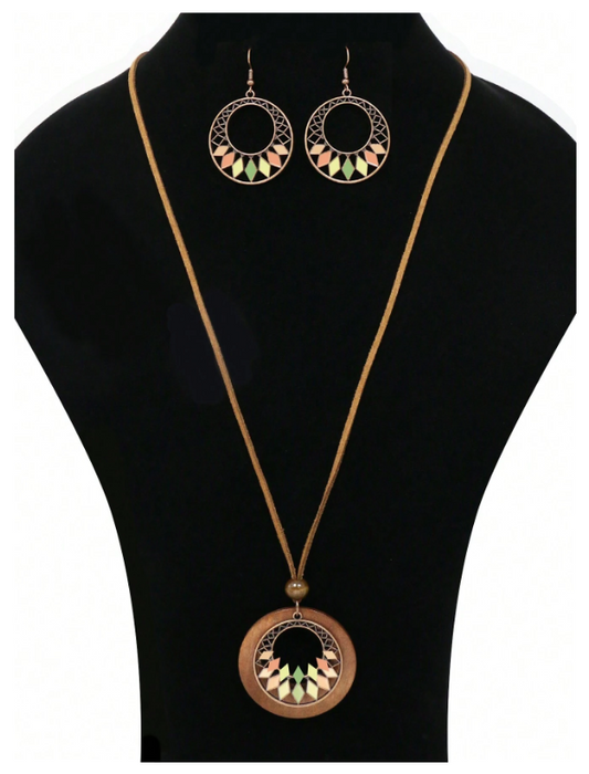 Get your fall vibes on with this funky Boho necklace set! Featuring multi-media, copper-tone medallions that add a pop of color and style to your bohemian look. Get ready to rock this unique and comfortable dangle necklace and earring combo!