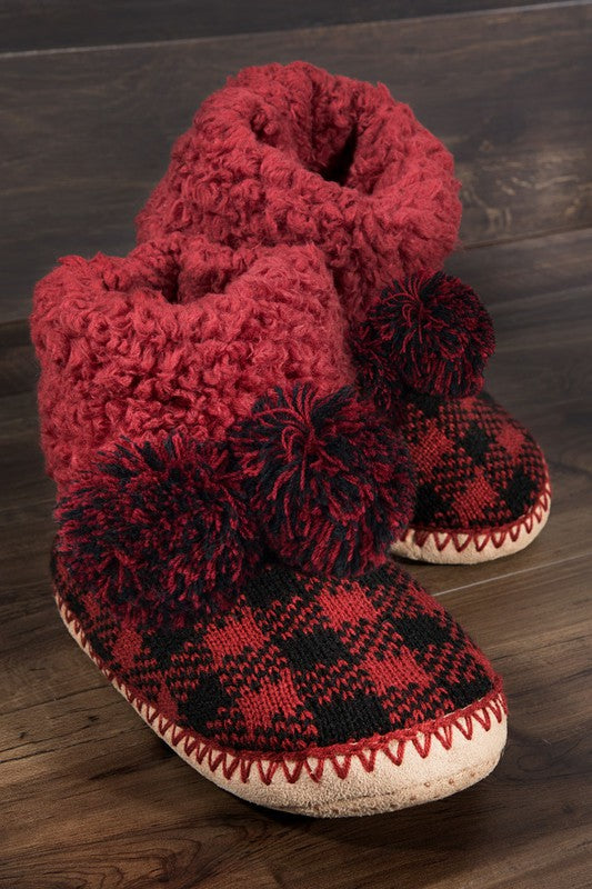 Upper: 100% Acrylic / Lining:100% Polyester / Out-sole: 100% Polyester  Cozy doesn't get any cozier than these faux furrrry slipper booties with a decorative pom tie and non-skid bottoms. The lining adds another layer of ahhhh as you lounge around home in style and comfort.  Sizing: S/M: shoe size 6-7 L/XL: shoe size 8-10