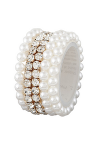 Have fun wearing one or see how five satisfies- more is better with this set! Versatility is the name of the game with this set of five bracelets (3 cream 2 bling).