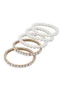 Have fun wearing one or see how five satisfies- more is better with this set! Versatility is the name of the game with this set of five bracelets (3 cream 2 bling).